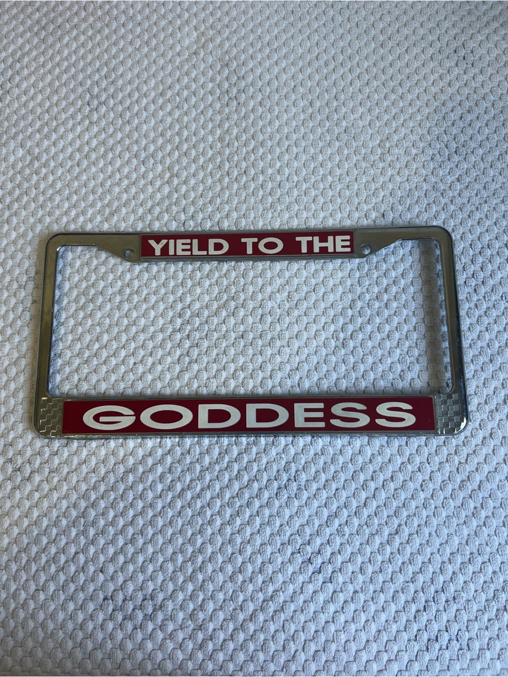 “Yield to the Goddess” License Plate Frame